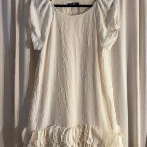 Elegant Cream Dress with Ruffle Hem